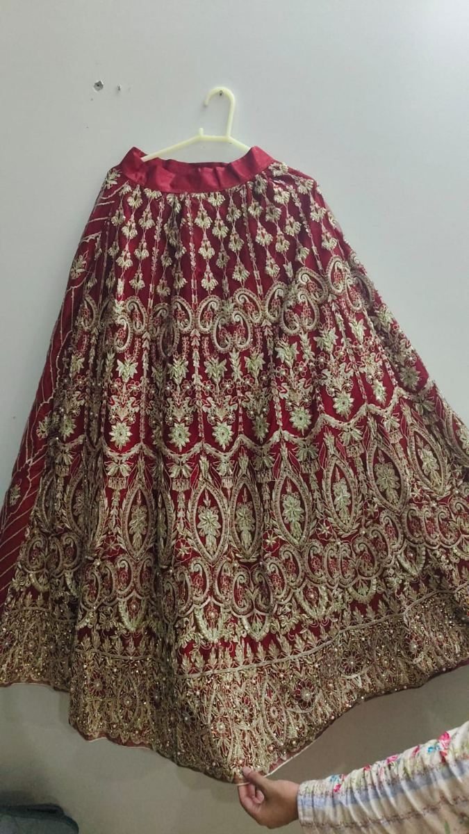 Dark red Bridal lehnga by MM Humayun, Lahore