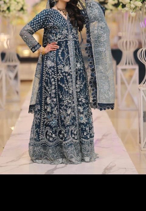 A deep teal blue: A heavily formal Anarkali-style maxi gown by Republic womens wear