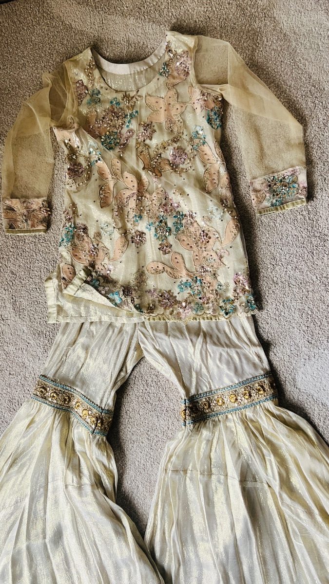 Off white golden sharara and short shirt