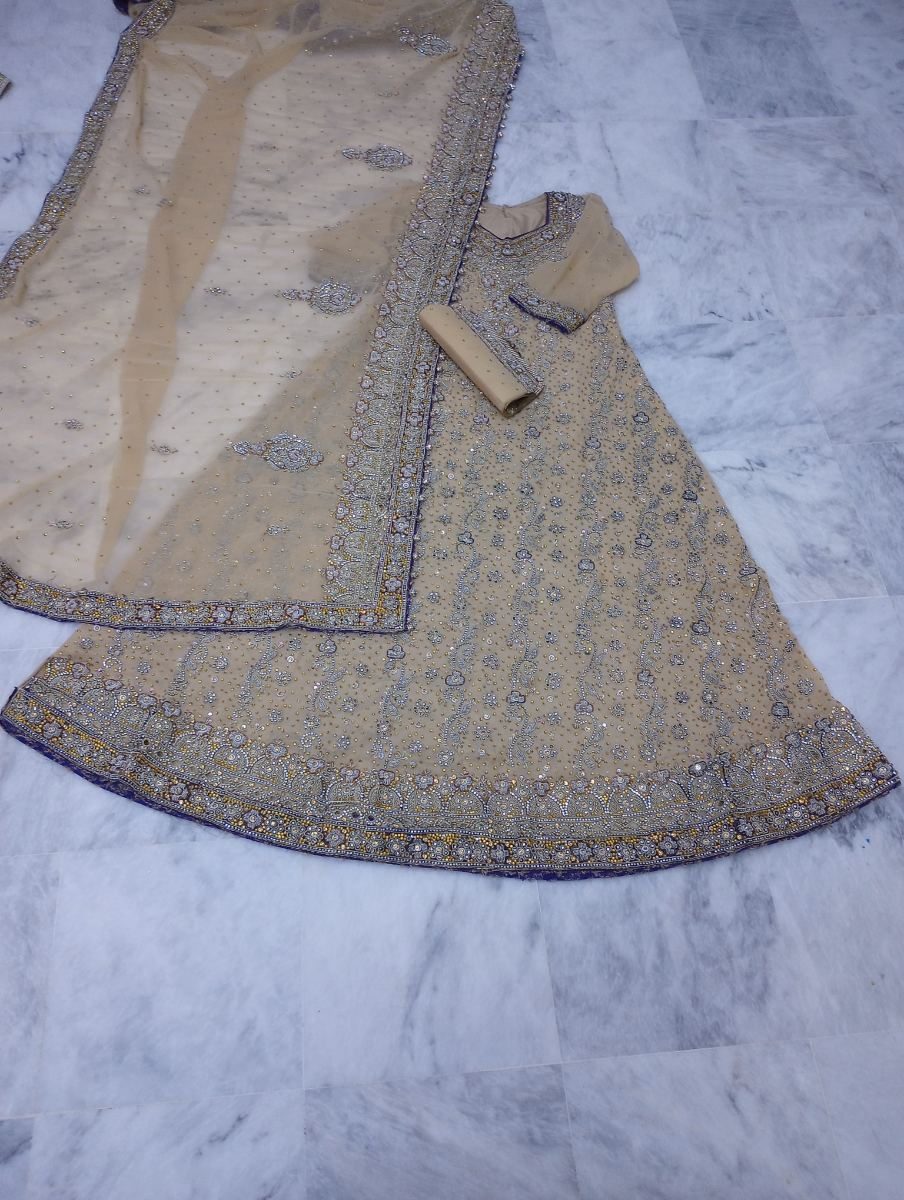 Bridal golden valima maxi with light purple touch and golden handwork