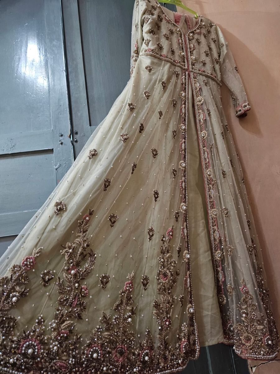 Elegant beige/ivory open maxi with beautiful intricate handwork and pearl detailing. 🤍